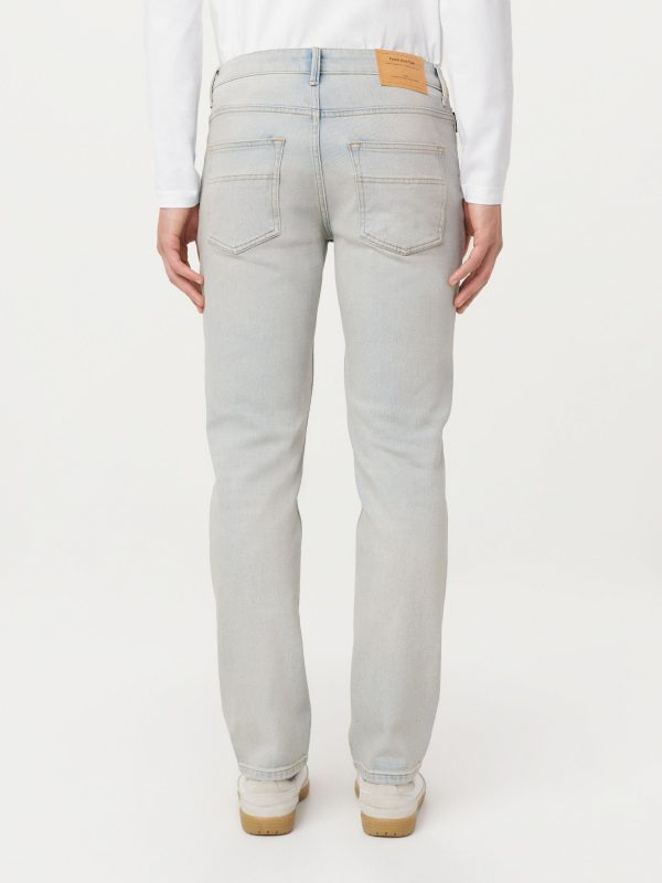 The Adam Slim Jean in Dirty Light Indigo Supply