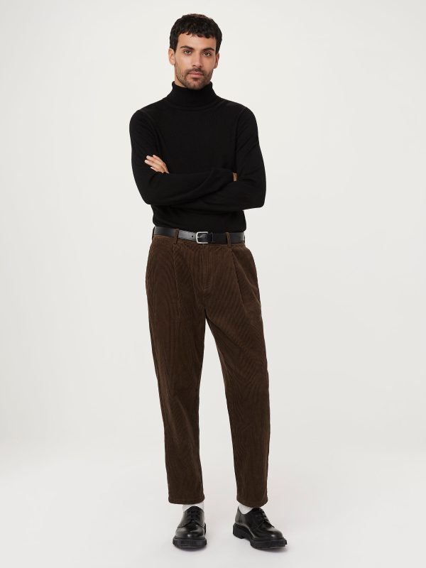 The Merino Wool Turtleneck in Black Hot on Sale