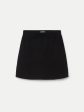 The Compact Mini Skirt in Black Supply