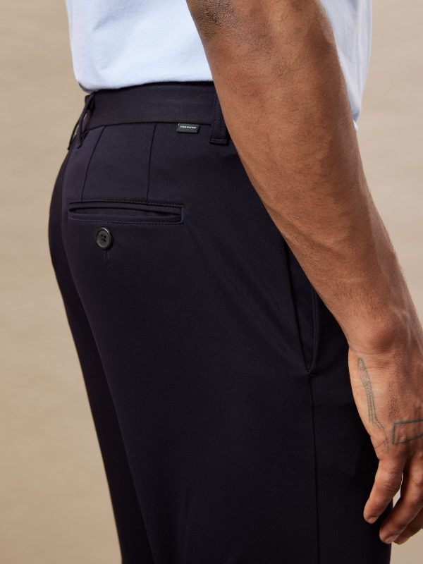 The Colin Tapered Flex Pant in Navy Hot on Sale