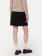 The Compact Mini Skirt in Black Supply